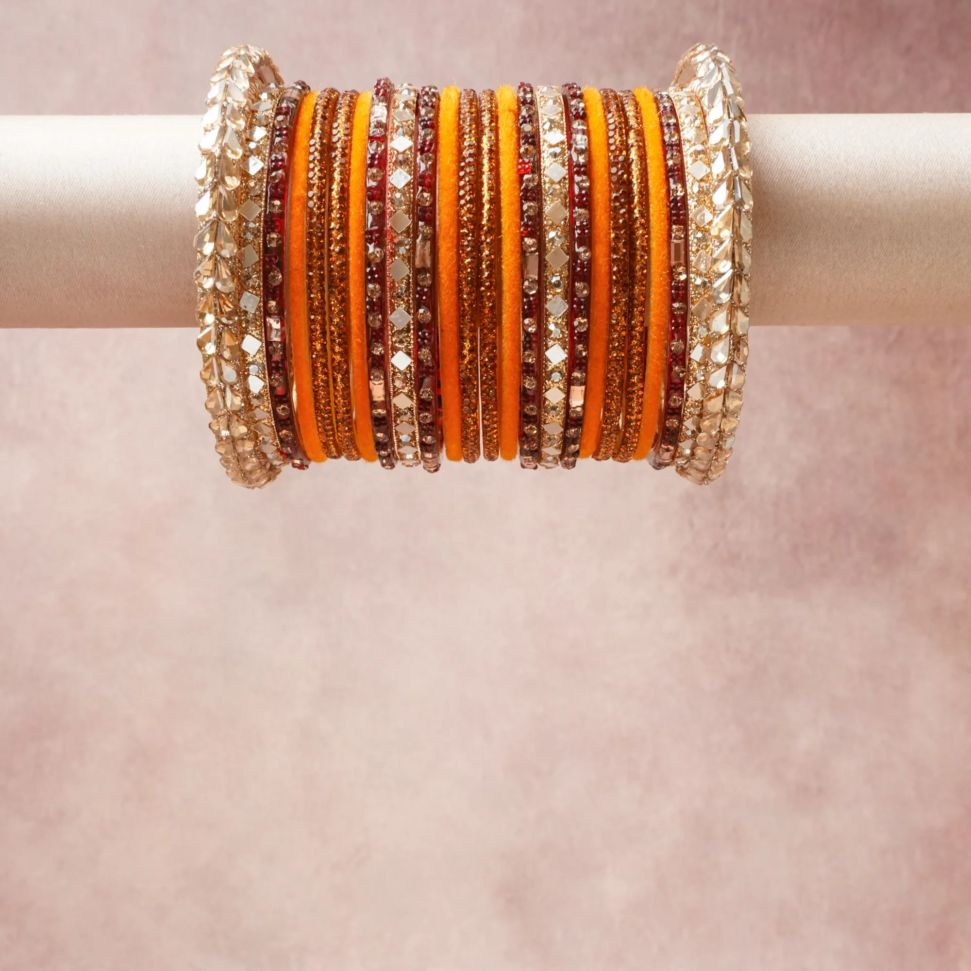 A grounding Marigold Yellow forms the heart of the set, while touches of Antique Gold, Scarlet Red add charm.

A thoughtful composition of Velvet, Gold-plated Metal, Mirror, Rhinestone, Glass, designed to feel complete without being heavy.
Each element layers seamlessly, creating a look that is refined, wearable and quietly striking.